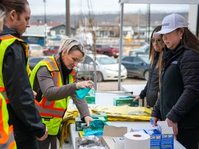 Volunteers signing up for Community Cleanup
