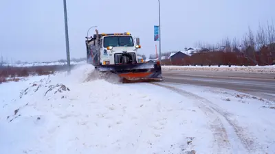 Snowplow clearing snow