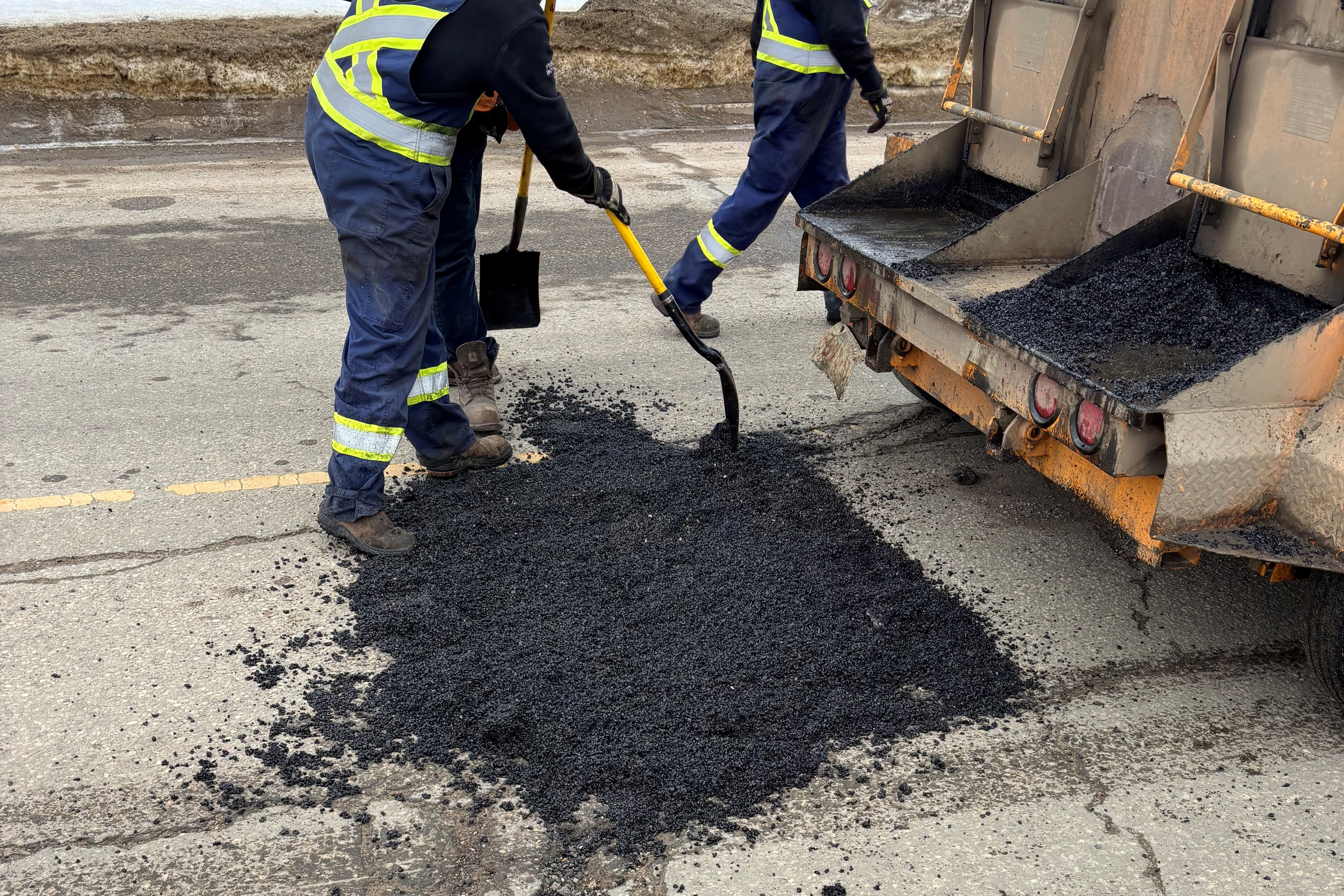Roads crew working on pothole