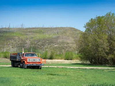 Truck in a grass field 
