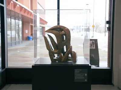 A complex sculpture in a glass case displayed in Jubilee lobby